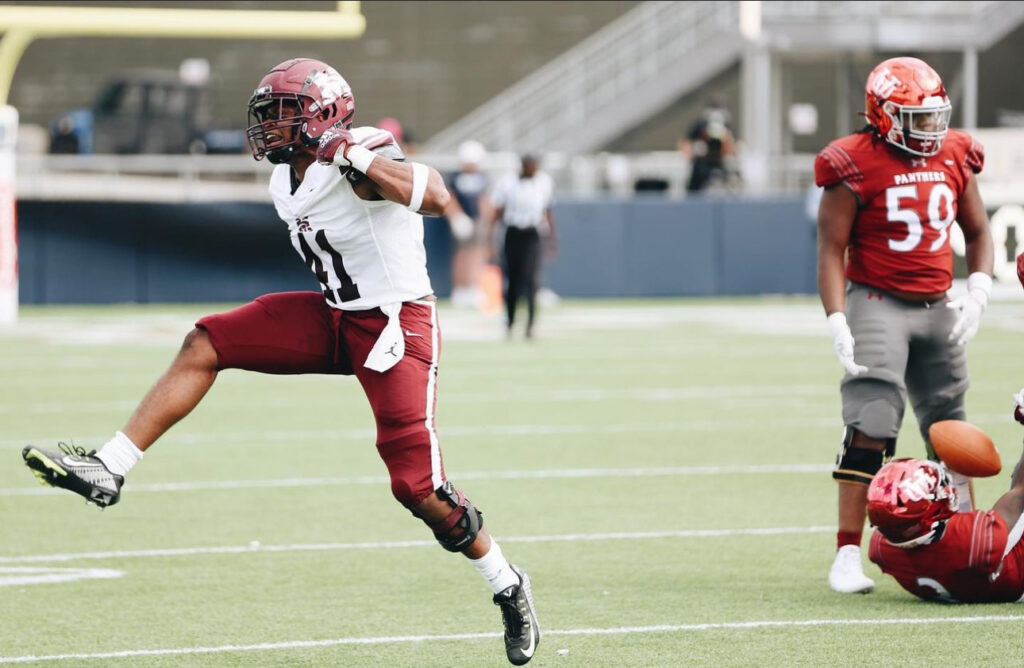 Daylon Land after a big hit. via @morehousefootball