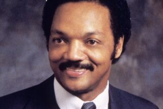 Jesse Jackson, civil rights leader and two-time presidential candidate, is pictured here in a professional headshot.
